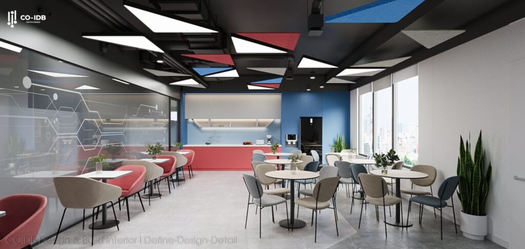 The pantry counter is designed with bright colors creating an ideal resting space for employees